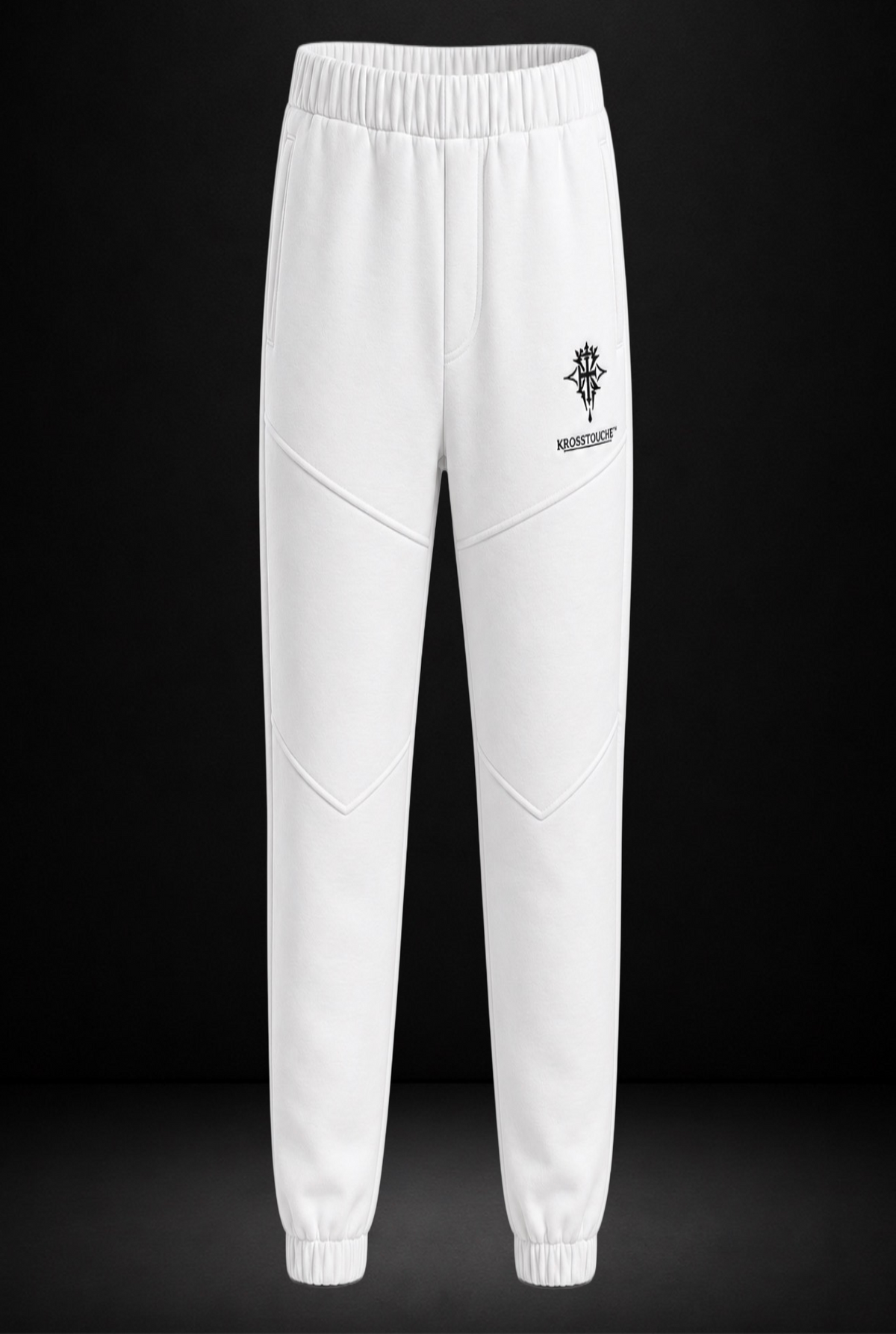 Front view of the KROSSTOUCHE® Signature Crest Panelled Joggers in Optic White with black crest logo, wordmark and sculpted leg panelling.