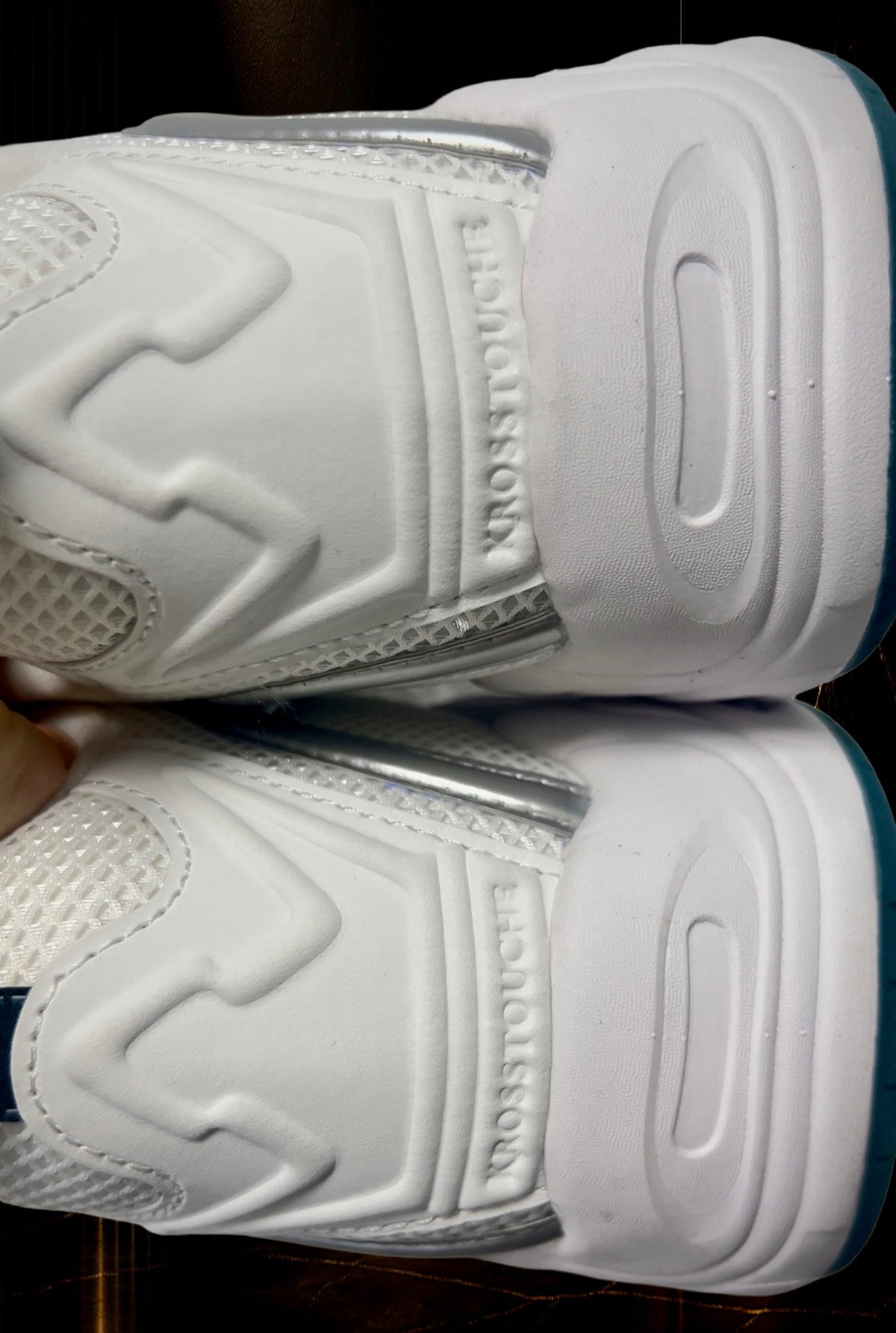 KROSSTOUCHE® CROWN RUNNER 01 luxury sneaker close-up showing the sculpted white midsole, textured mesh and embossed KROSSTOUCHE® branding