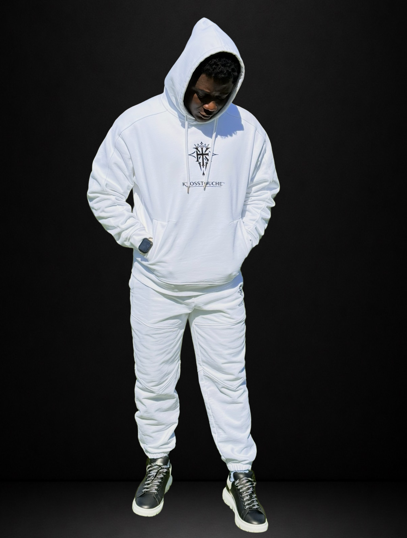 Front view of the KROSSTOUCHE® Providence optic white tracksuit showing its structured fit and signature detailing