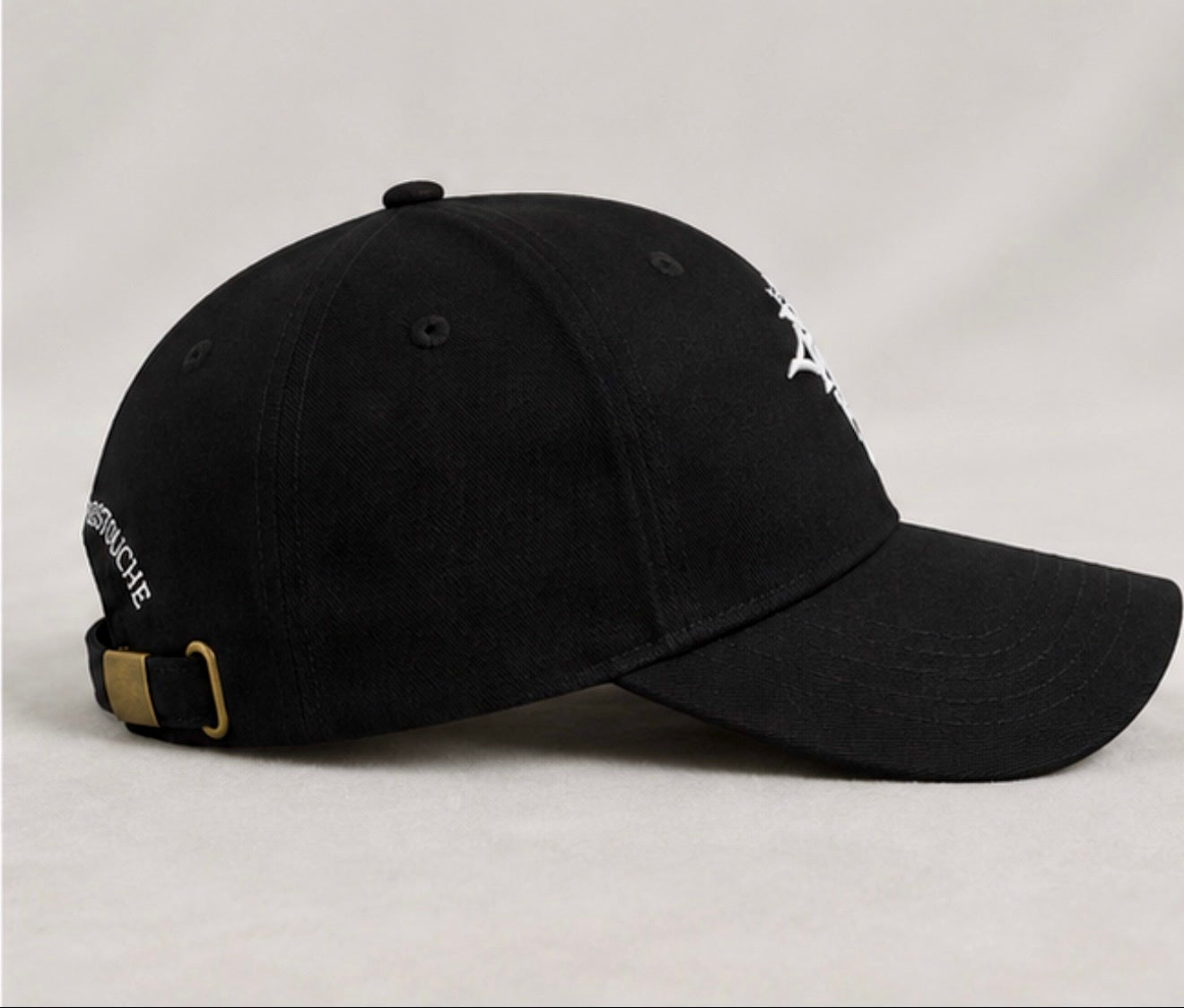 Right side view of the KROSSTOUCHE® Signature Black Baseball Cap showing the structured six-panel design.